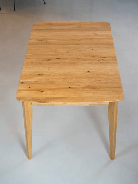 Extendable dining table of solid oak modern natural Vega